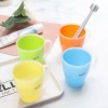 Candy-colored mouthwash cup, simple bathroom, travel couple, creative brushing and washing plastic toothbrush cup details Picture
